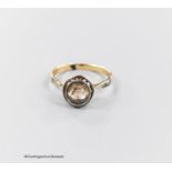 An antique continental yellow metal and solitaire rose cut diamond set ring, size M/N, gross