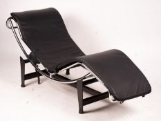 A Corbusier style black leather chaise longue, length 158cm, depth 54cm, height 73cm