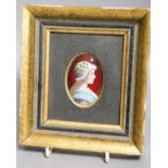 A small oval Limoges miniature enamelled portrait plaque, signed L. Fauré, framed8x5.5cm excl frame
