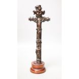 A carved wood crucifix33cm