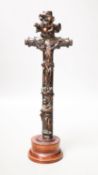 A carved wood crucifix33cm