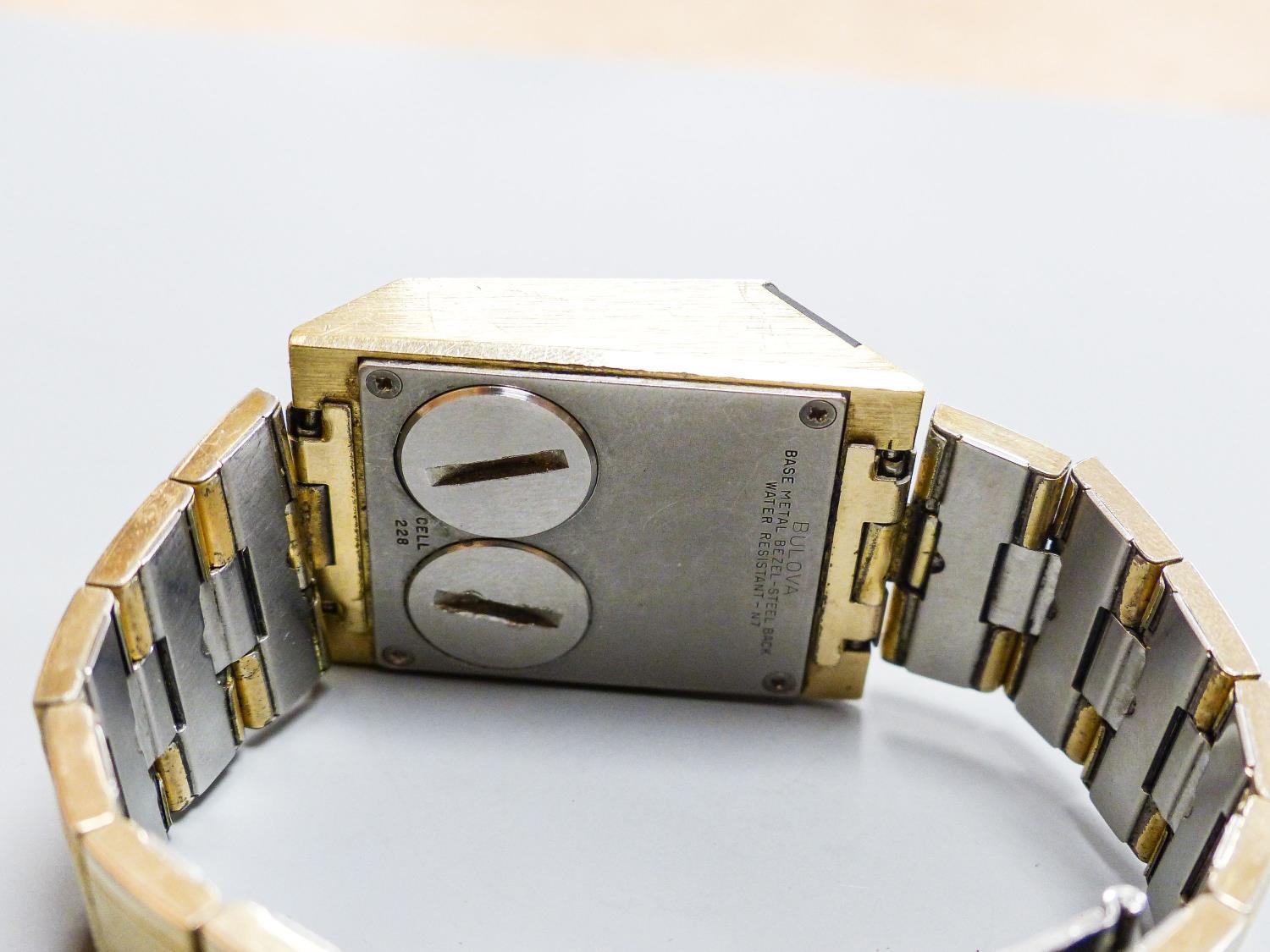 A gentleman's steel and gilt base metal Bulova digital wrist watch, on Bulova bracelet, case - Image 4 of 5