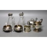 A pair of Victorian silver bun salts, London, 1859, two silver spoons, two mounted whisky tot jug (