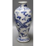 A 19th century Chinese blue and white dragon vase,A section of the foot broken and re-glued with