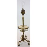 A late Victorian cast brass lamp standard, the column with an alabaster mid tier, raised on an