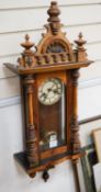 A small late 19th century Vienna wall clock, fitted with an eight day striking movement