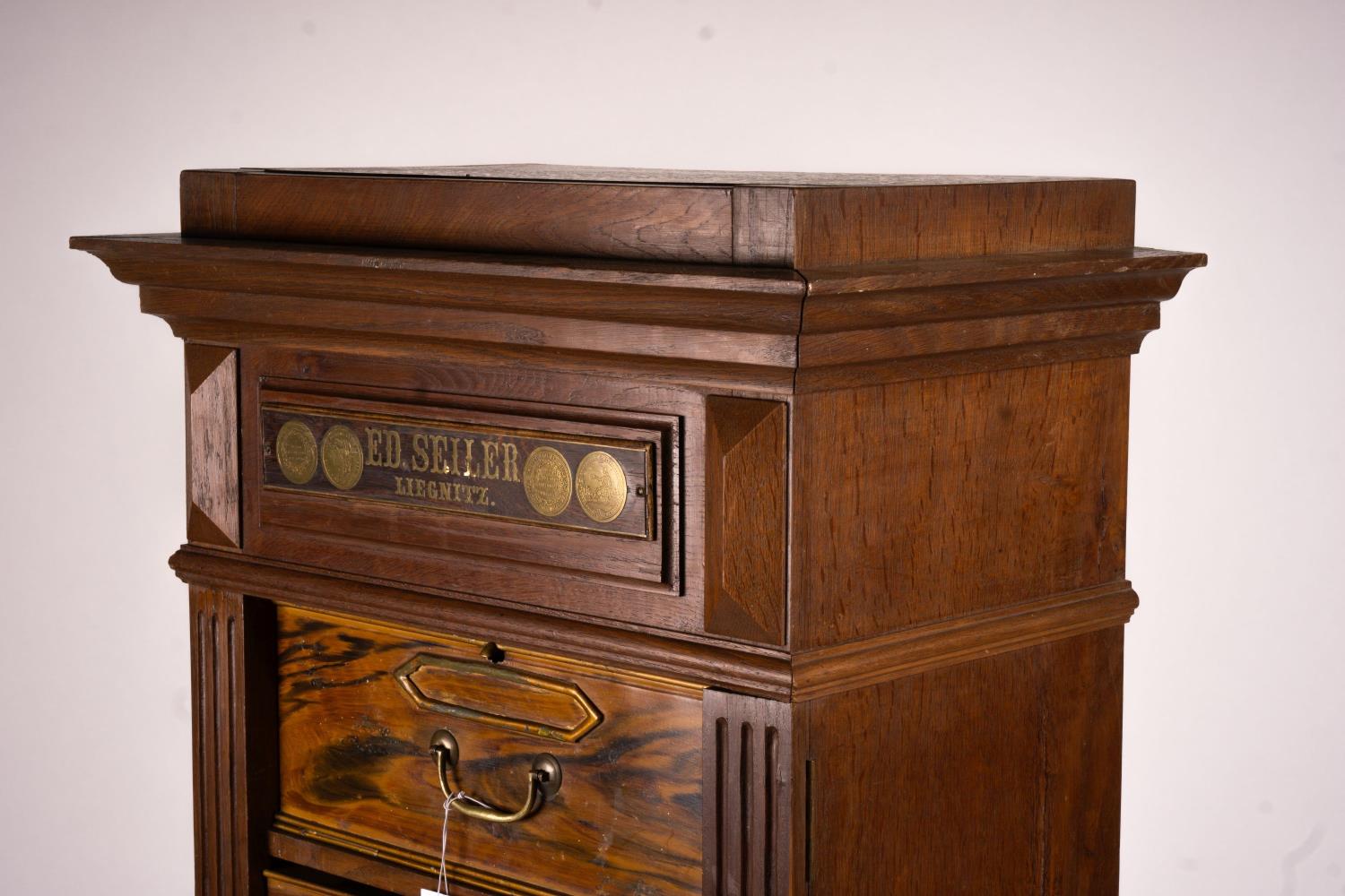 A late 19th / early 20th century oak and simulated walnut shop storage chest / filing cabinet, - Image 2 of 5