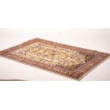 A North West Persian ivory ground 'tree of life' rug, 178 x 125cm