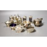 Twelve assorted 20th century silver condiments including an Art Deco three piece set, Birmingham,