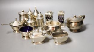 Twelve assorted 20th century silver condiments including an Art Deco three piece set, Birmingham,