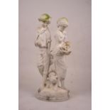 A reconstituted stone garden ornament of fruit and flower pickers, height 89cm