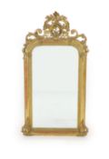 A 19th century French carved giltwood and gesso wall mirrorwith arched plate and ripple moulded