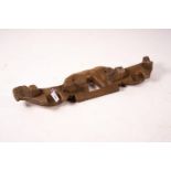 A 19th century Spanish carved fruitwood ox yoke, length 108cm