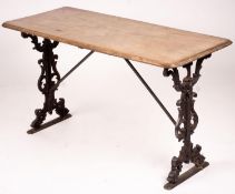 A Victorian style rectangular mahogany and cast iron tavern table, width 120cm, depth 52cm, height