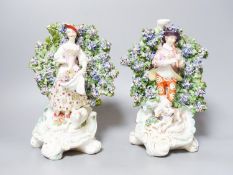 A pair of Derby bocage figures, c.1775, patch marks, 24.5 cm high, damage