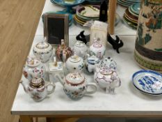 13 V&A collection and other miniature porcelain teapots.