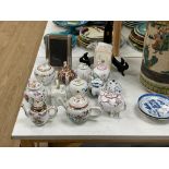 13 V&A collection and other miniature porcelain teapots.