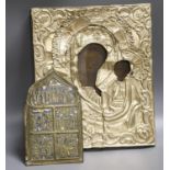 A Russian base metal oklad icon and a similar enamelled bronze panel, once part of a