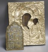 A Russian base metal oklad icon and a similar enamelled bronze panel, once part of a