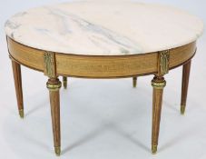 A Louis XVI inlaid mahogany circular marble topped table, diameter 86cm, height 46cm