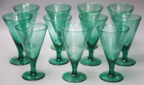 Eleven green wine glasses