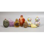 A group of Chinese jade, hardstone and glass snuff bottles, tallest 9.5 cm