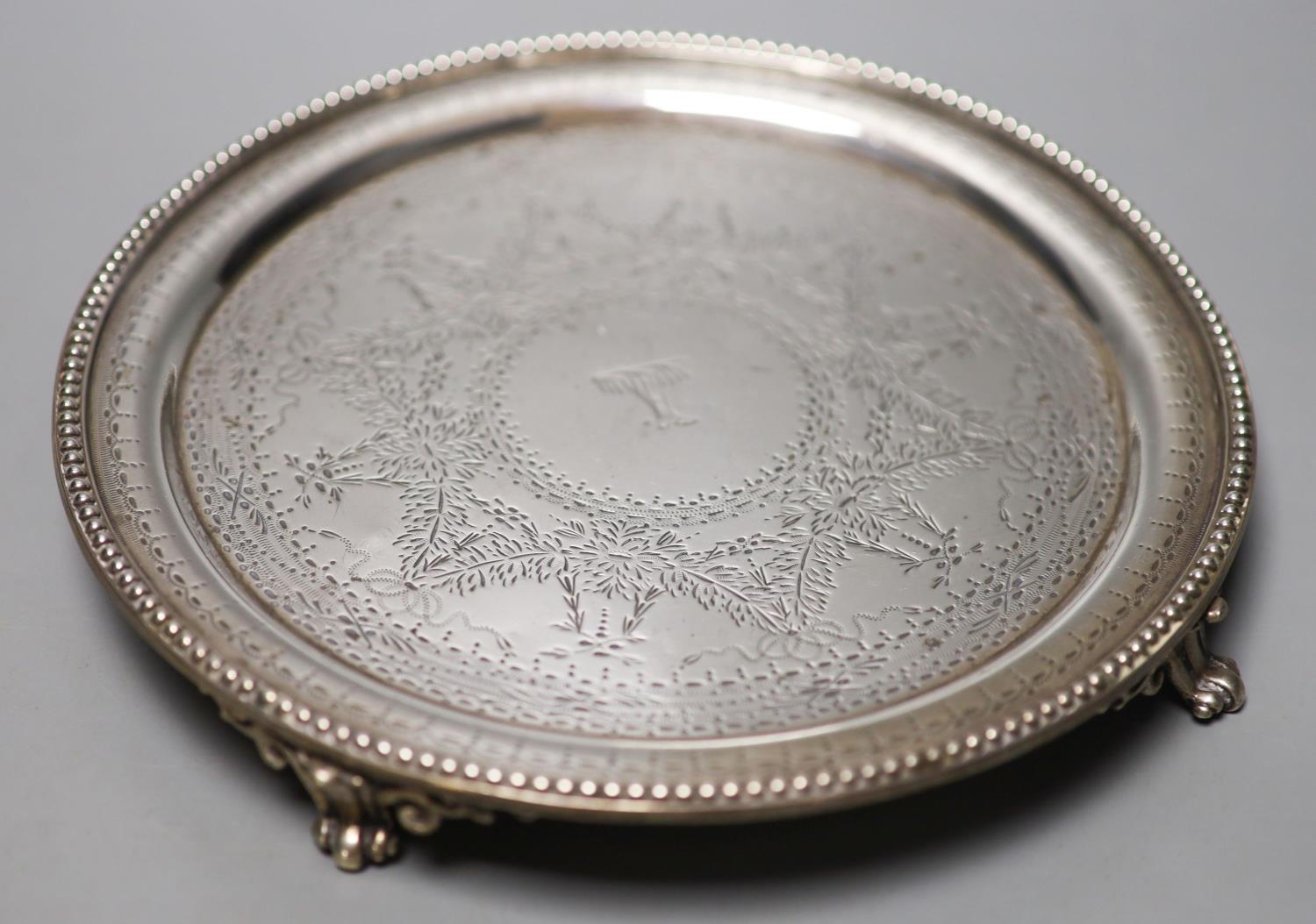 A Victorian circular engraved silver waiter, Daniel & Charles Houle, London, 1867, 20.7cm, 12.5oz.