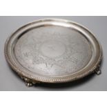 A Victorian circular engraved silver waiter, Daniel & Charles Houle, London, 1867, 20.7cm, 12.5oz.