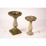 A reconstituted stone baluster pillar sundial and bird bath, tallest 72cm