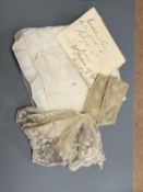 A George III handkerchief with George III cypher and three pieces of lace (4)