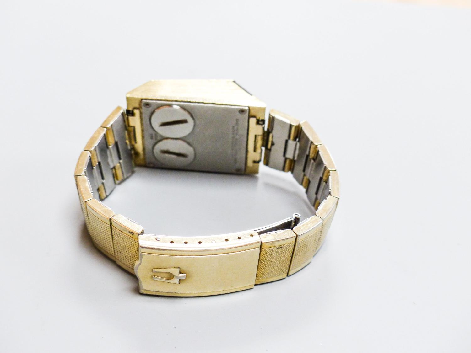 A gentleman's steel and gilt base metal Bulova digital wrist watch, on Bulova bracelet, case - Image 5 of 5