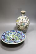 A Persian Iznik style pottery bowl and a Persian Qajar dynasty vase, 22.5cm