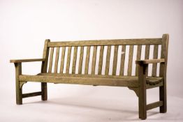 A weathered teak garden bench, length 192cm, width 60cm, height 85cm