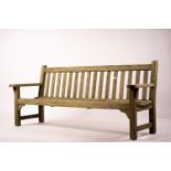 A weathered teak garden bench, length 192cm, width 60cm, height 85cm