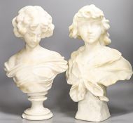 Two white alabaster busts of young women, raised on turned plinths44cm