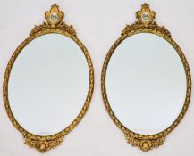 A pair of oval giltwood wall mirror, width 42cm, height 78cm