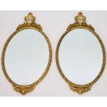 A pair of oval giltwood wall mirror, width 42cm, height 78cm