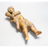 An Italian limewood figure of a cherub, 19th century