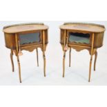 A pair of Edwardian inlaid mahogany kidney shaped side cabinets, each fitted with a central glazed