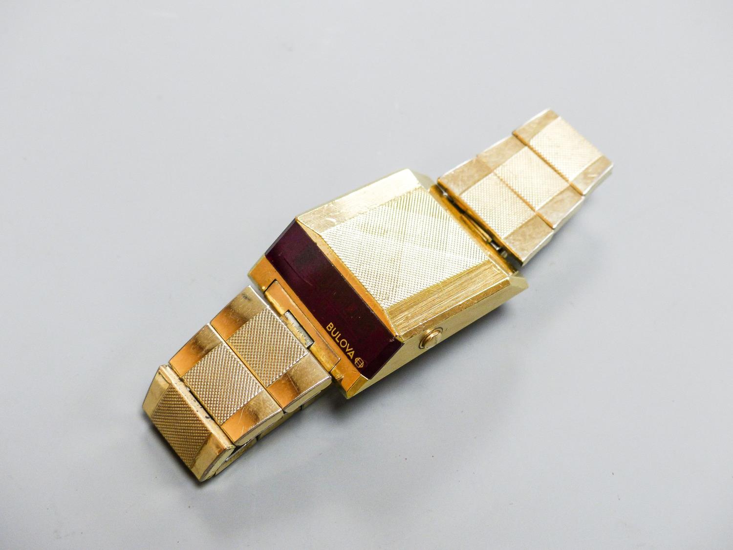 A gentleman's steel and gilt base metal Bulova digital wrist watch, on Bulova bracelet, case - Image 2 of 5