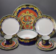 A group of Versace Rosenthal Le Roi Soleil plates and coffee cups and saucers and a bowl, 18.5cm,