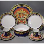 A group of Versace Rosenthal Le Roi Soleil plates and coffee cups and saucers and a bowl, 18.5cm,