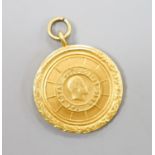 A 1930's 9ct gold RAC medallion, 26mm, 11.7 grams.