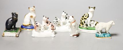 Six French porcelain cat figures or groups, and a similar sheep figure, late 19th