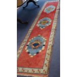 Two Caucasian design runners, larger 350 x 74cm