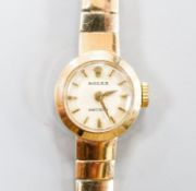A lady's 9ct gold Rolex manual wind wrist watch on 9ct gold strap, case diameter 15mm,gross weight