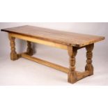 An 18th century style rectangular oak refectory dining table, length 238cm, depth 73cm, height 75cm