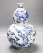 An impressive Chinese blue and white double gourd ‘dragon’ vase37cm