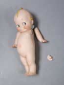 A Rose O'Neil Kewpie doll, arms detached, 26cm