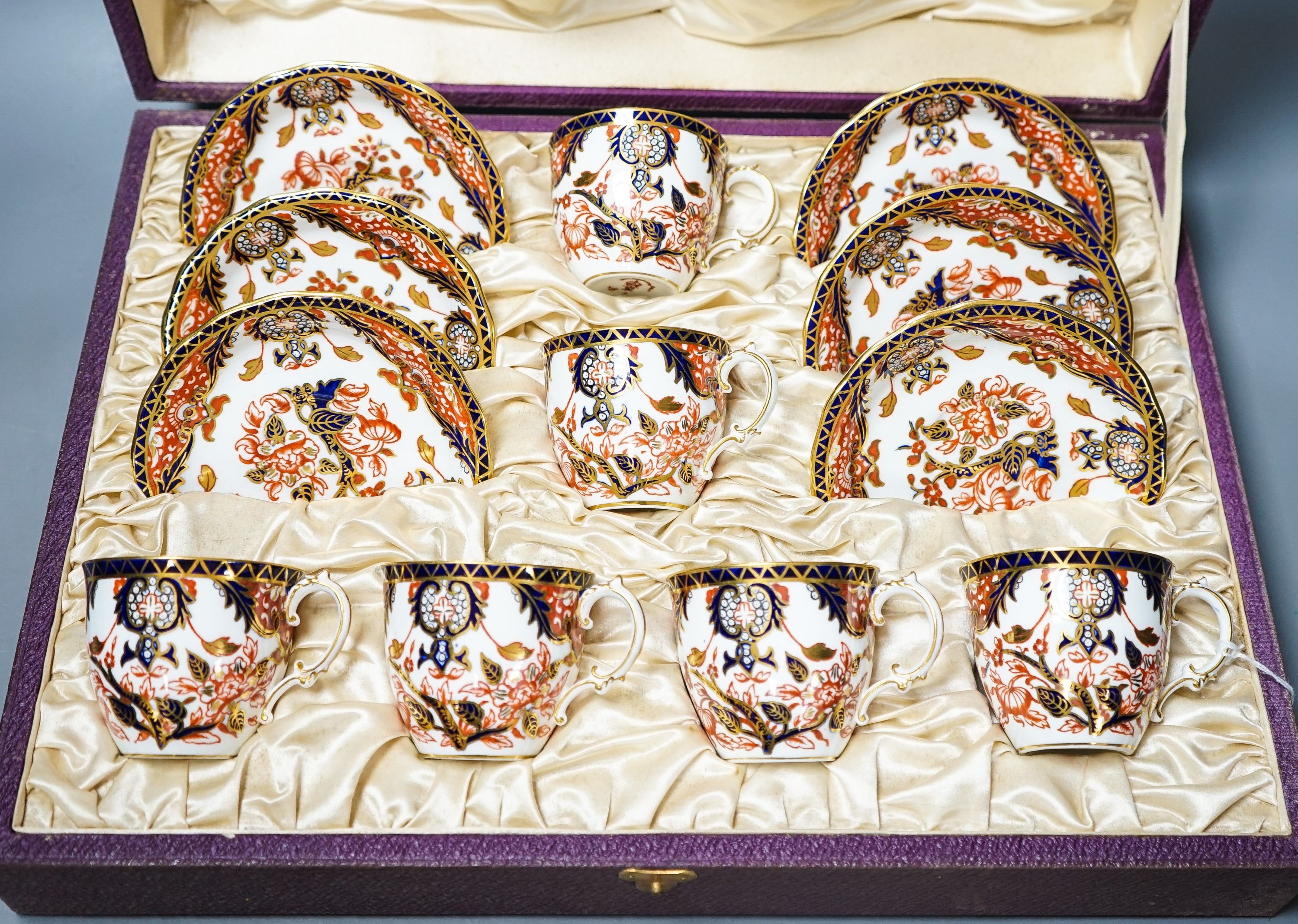 A cased Crown Derby Imari pattern coffee service